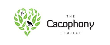 A logo showing a heartshaped drawing made up of green leaves, with a black tui at its centre and a black musical note at the top left. The words 'The Cacophony Project' are printed next to this in black type.